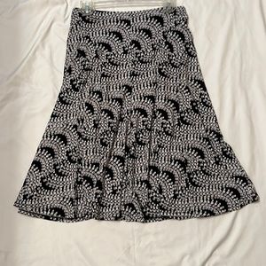 Elastic waist skirt. Comfortable for office attire, work, or play!